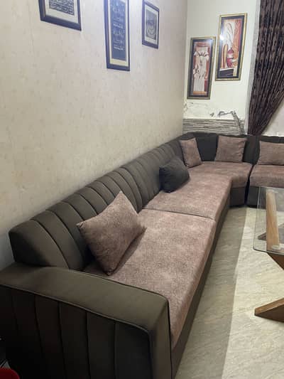 Almost Brand new slightly used 9 seater L shaped sofa