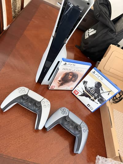 PlayStation 5 Slim Disc with 2 controllers and 2 games