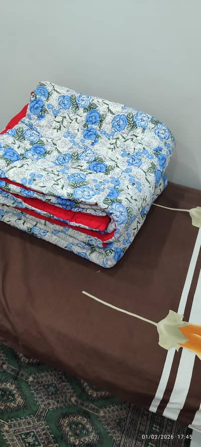 Two single new quilts best quality cotton  filled  for sale. Negotiable