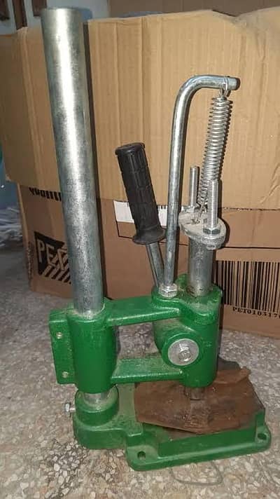 Press and punch machine for LED bulb making