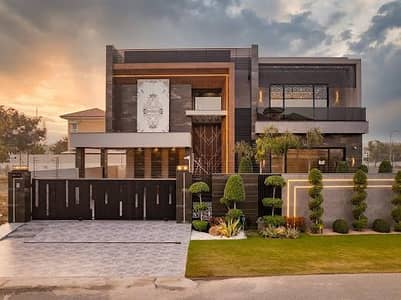 FULL BASEMENT MODERN DESIGN BRAND NEW 1-KANAL ELEGANT AND SUPER HOT LOCATED BUNGALOW WITH LIFT IS AVAILABLE IN THE BEST BLOCK OF DHA LAHORE.