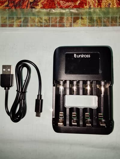 Uniross Ultra fast bettery cell charger for AA & AAA betteries-charge