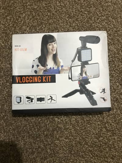 Vlogging kit. All-in-one video making kit with tripod stand