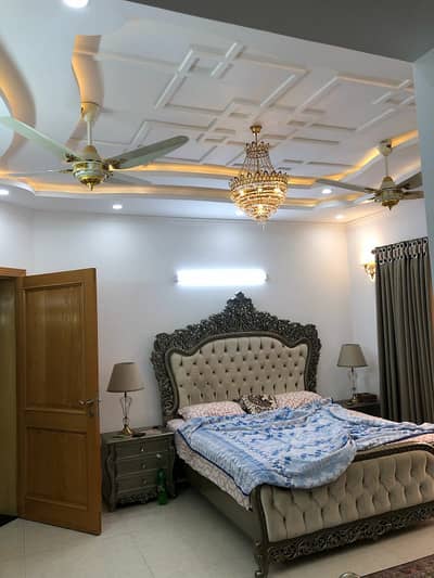 DHA LAHORE PHASE-4 5-BedRoom 2-Kitchens 2-Servant-Quarters Good Condition House at Prime Location