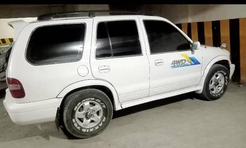 kia Sportage 2003 for what up 03032042154