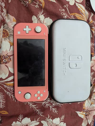 Nintendo switch lite jailbreaked with pouch and games installed