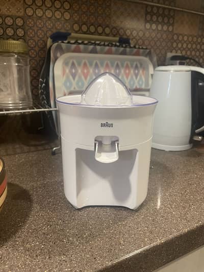 Braun citrus press