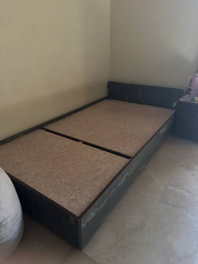 Single wooden bed