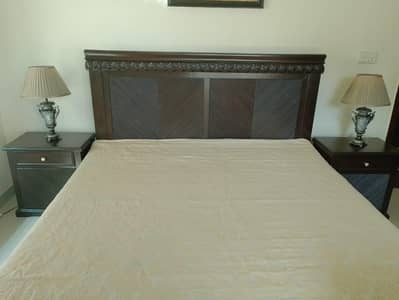 Bed with 2 side tables, dressing table with mirror anda dressing stool