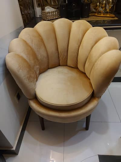 Golden sitting chair