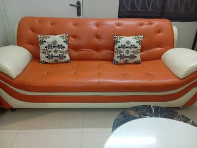 orange & haft white ledar sofa