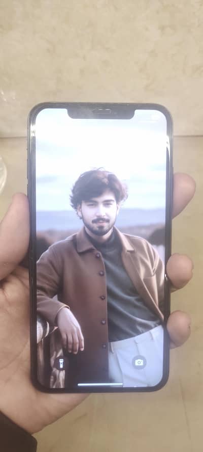 I phone xs max back battery health 79 with  charger 64