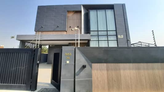20 MARLA ELEGANT AND FULLY MAINTAINED SUPER HOT LOCATED MAZHAR MUNIR DESIGNED BUNGALOW WITH BASEMENT IS AVAILABLE IN THE BEST BLOCK OF DHA LAHORE.