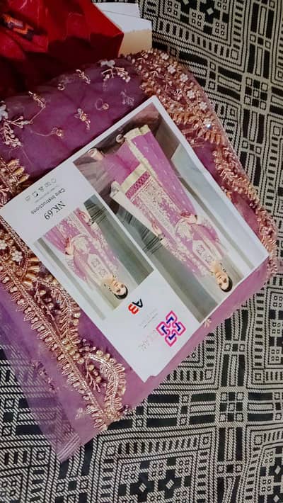 Heavy shirt with patches, embroidery dupatta,patches,back,and trouser