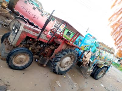 Mf 240 tractor with water tanker