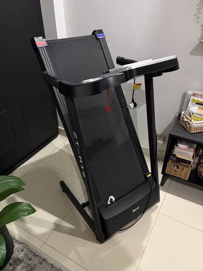 Compact Folding Treadmill - 1.5HP, 12 Programs, Heart Monitor, Speaker