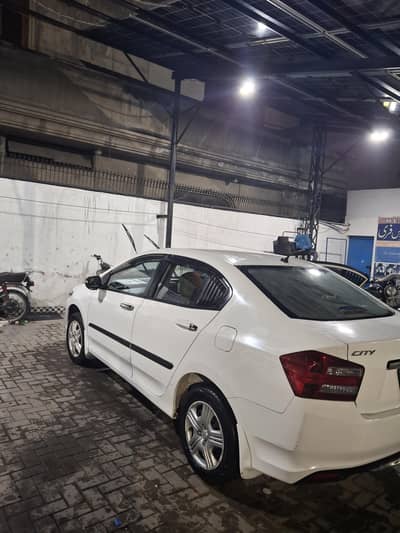 Honda city total ganiun exchange possible with home in Gujranwala