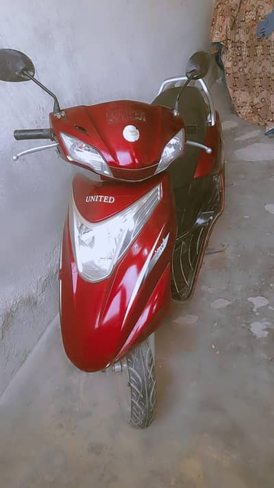 United Mehroon 100 CC