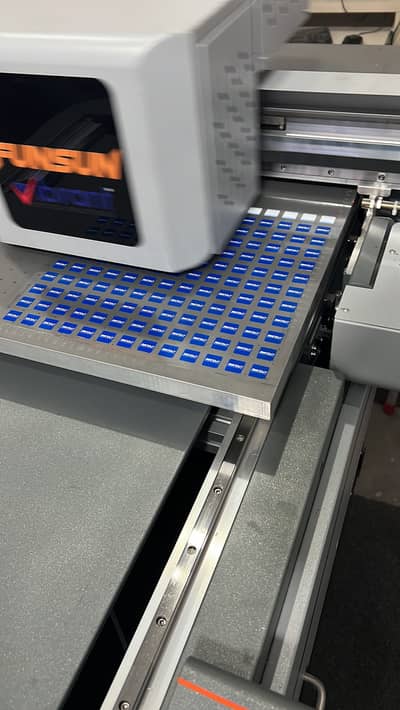 Graphic designer and uv printer operater