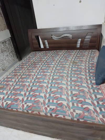 Bed with mattress