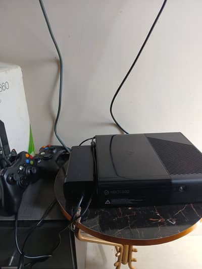 Xbox 360 ultra slim with 2 controllers and box