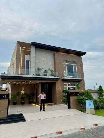 BRAND NEW 20-MARLA ELEGANT AND SUPER HOT LOCATED BUNGALOW IS AVAILABLE IN THE BEST BLOCK OF DHA LAHORE