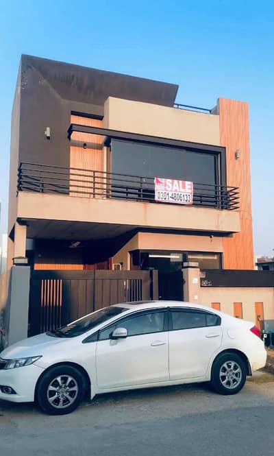 BRAND NEW 5-MARLA ELEGANT AND SUPER HOT LOCATED BUNGALOW IS AVAILABLE IN THE BEST BLOCK OF DHA LAHORE.
