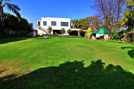 ON MAIN 150 FEET ROAD 4-KANAL (2-KANAL BUNGALOW+2-KANAL LAWN) ELEGANT AND FULLY MAINTAINED SUPER HOT LOCATED BUNGALOW IS AVAILABLE IN THE BEST BLOCK OF DHA PHASE 6 LAHORE