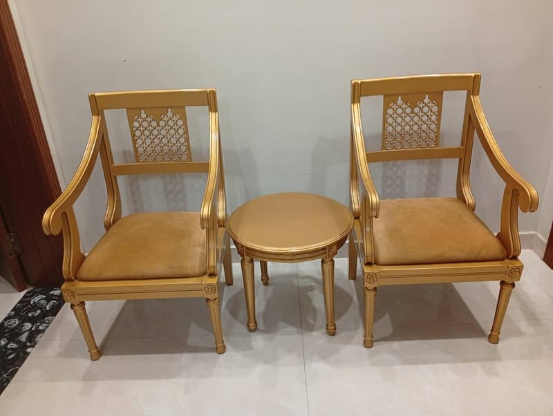 two chairs with table 0