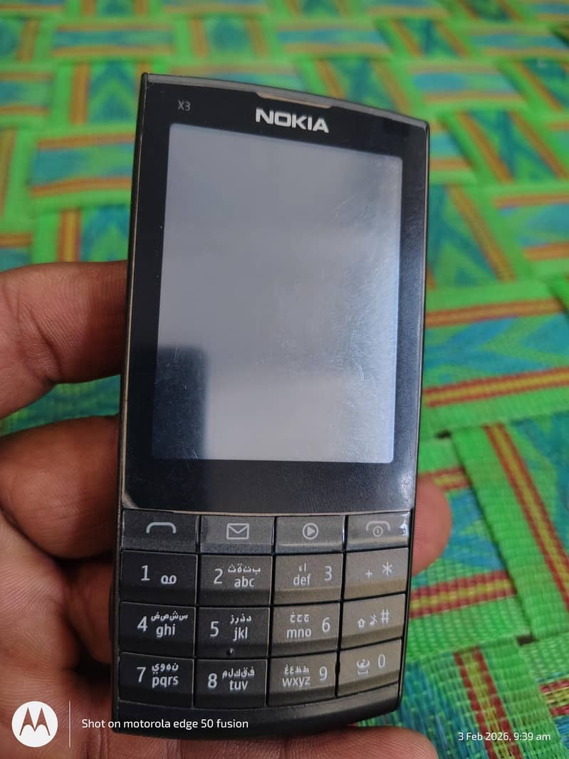 Nokia X302 1