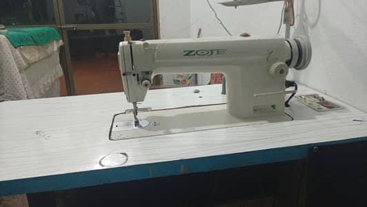 zoji sewing machine ha 250watt ki motor lagi ha