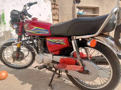 125 Honda red clour