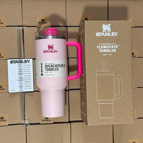 Premium stainless steel Stanley tumbler with handle and straw lid. Double-wall vacuum insulation keeps drinks hot or cold up to 6 hours. Durable, stain-proof, and ideal for travel, car, office, gym, and daily use.