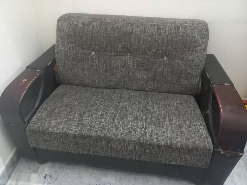 Sofa set 2+1  total 7 chairs 1 centre table 1 small table. 2