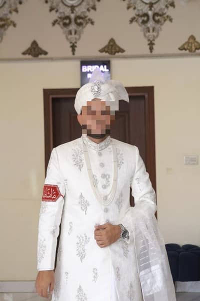 Sherwani With heavy Nakshi work on it brand new just used with kulla