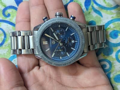 TAG Heuer Carrera Chronograph 44mm automatic watch with a blue dia