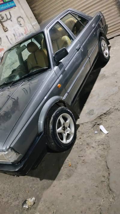 Nisan Sany 1986 modal