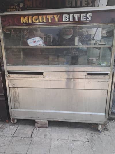 fast food counter with attached hot palate and soup bowl