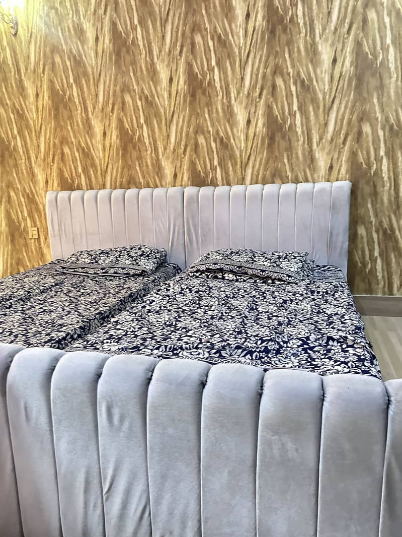 2 separate single beds 1