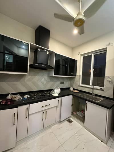 Separate Entrance, Lower Locked Stunning 10 Marla Upper Portion in DHA Phase 8 Ivy Green Featuring 3 Beds, 3 Baths, 1 Kitchen, TV Lounge, and Secure Car Parking Must See!