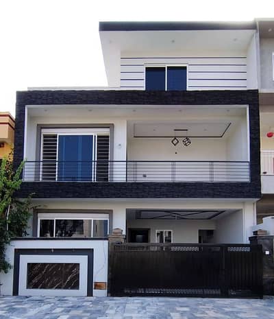 A Brand New Decent and Elegant Owner Build Triple Story House is Available For Sale in Jinnah Garden.