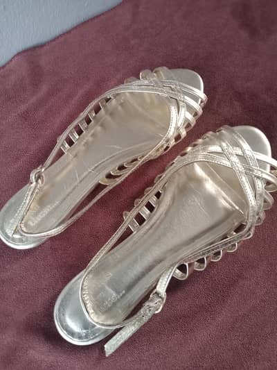 shine golden colour women sandal