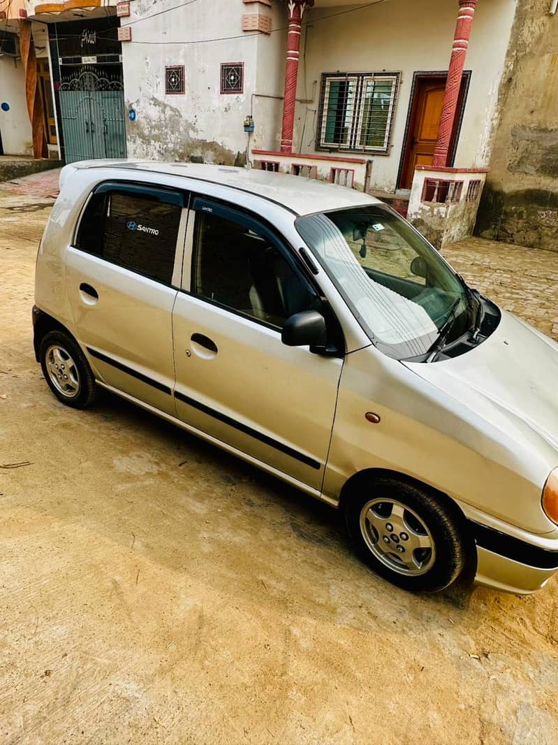 Santro 2007 power window&string 1