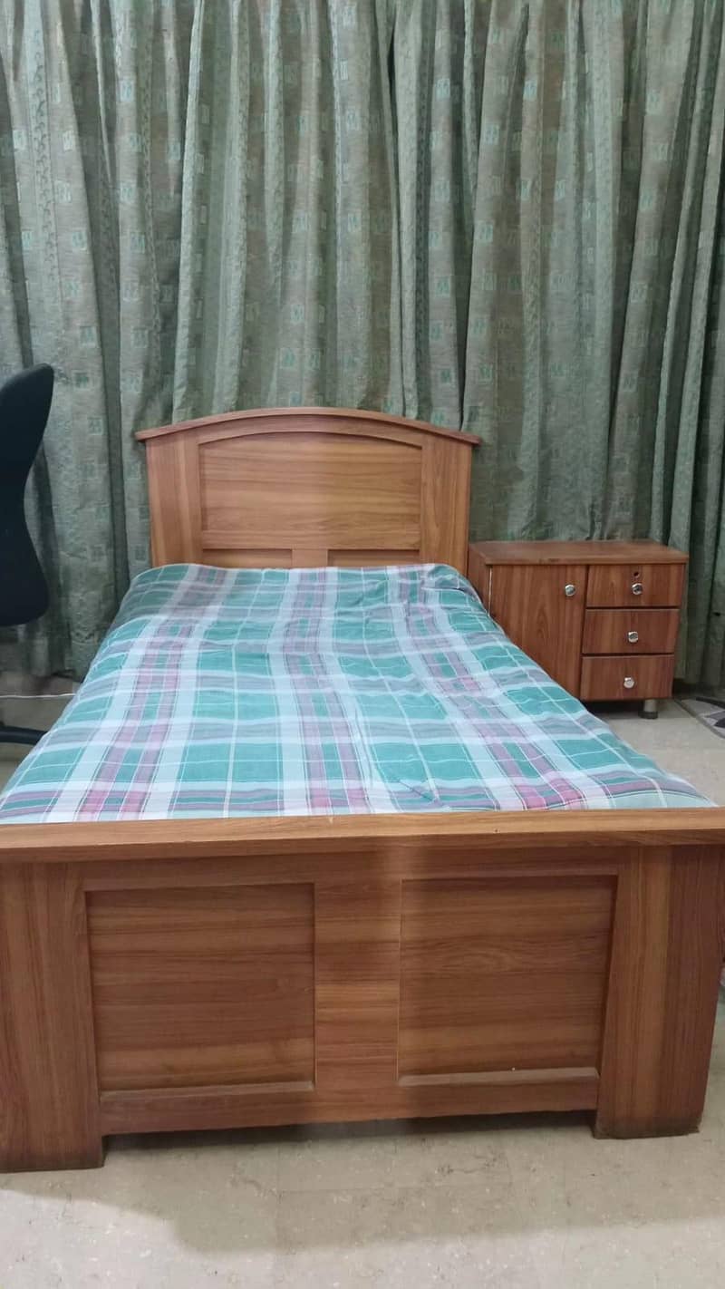 single bed with side table 0