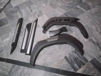 Revo/Rooco fender flares & side skirts.