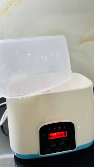 Feeder warmer and sterilizer