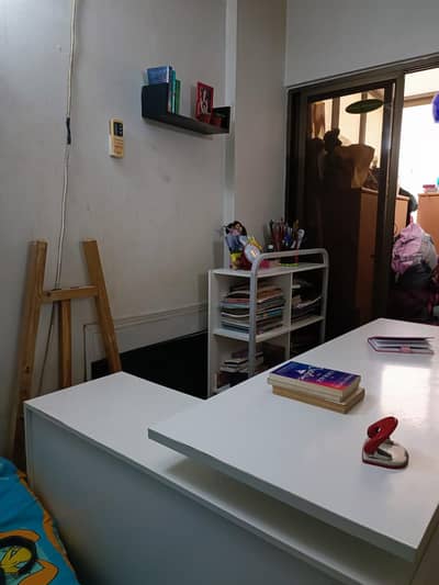 L shaped White Table