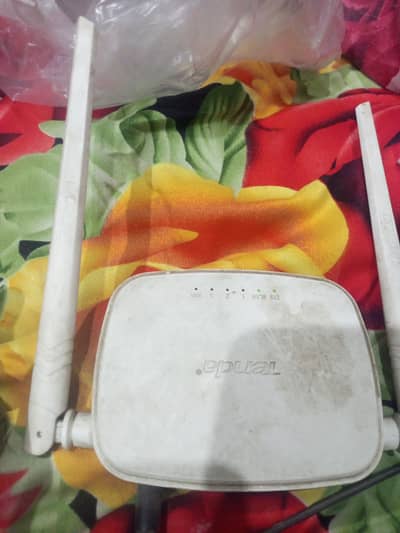 Tenda modem device and 30 meter wire