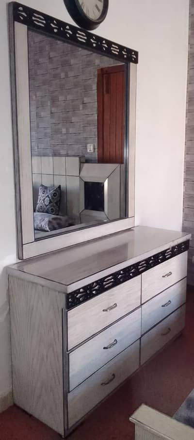 king size bed with dressing and side tables