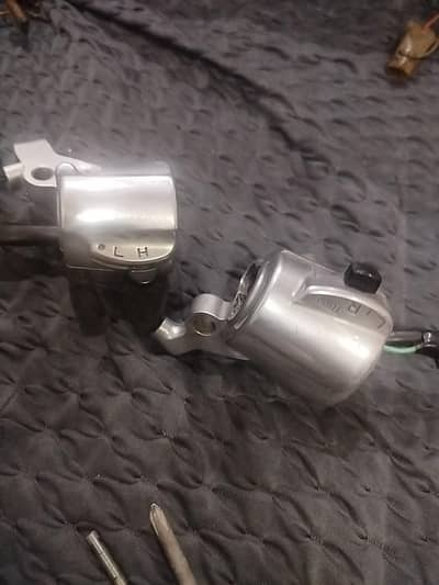 Honda 125 grips/assembly